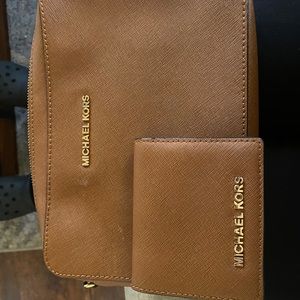 Michael Kors wallet and matt hung purse